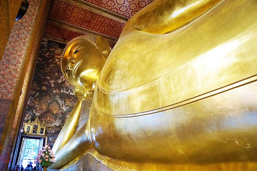 Visit the Reclining Buddha at Wat Pho Temple, Bangkok